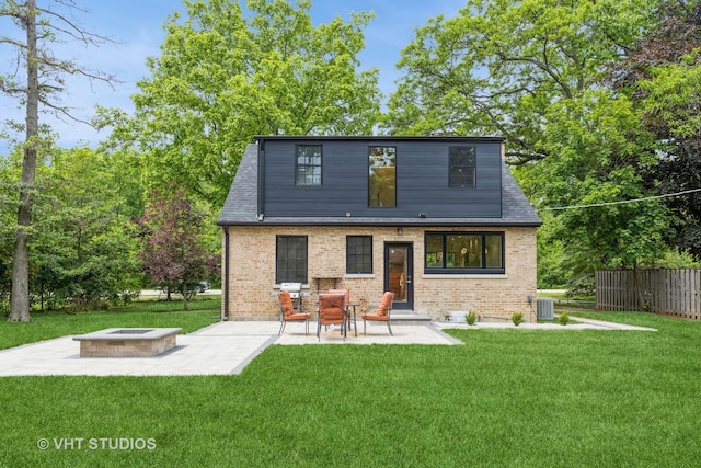 639 Harms Rd, Glenview, IL 60025 - back of house with a fire pit, a patio area, brick siding, and roof with shingles