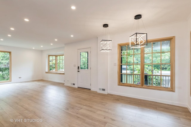 639 Harms Rd, Glenview, IL 60025 - entrance foyer featuring recessed lighting, light wood-style floors, a chandelier, and baseboards