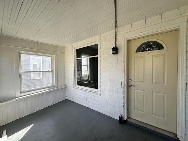 doorway to property featuring a porch
