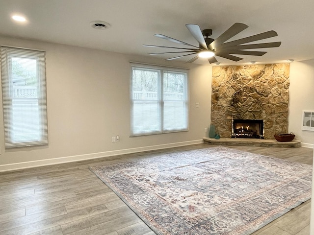 1299 Riverlane Dr, Bradley, IL 60915 - living room with wood finished floors, a wealth of natural light, baseboards, and ceiling fan