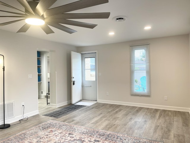 1299 Riverlane Dr, Bradley, IL 60915 - empty room with baseboards, visible vents, wood finished floors, and recessed lighting