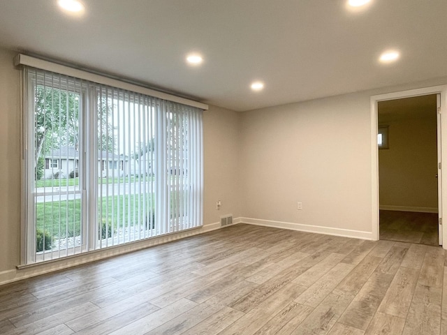 1299 Riverlane Dr, Bradley, IL 60915 - spare room featuring baseboards, visible vents, wood finished floors, and recessed lighting