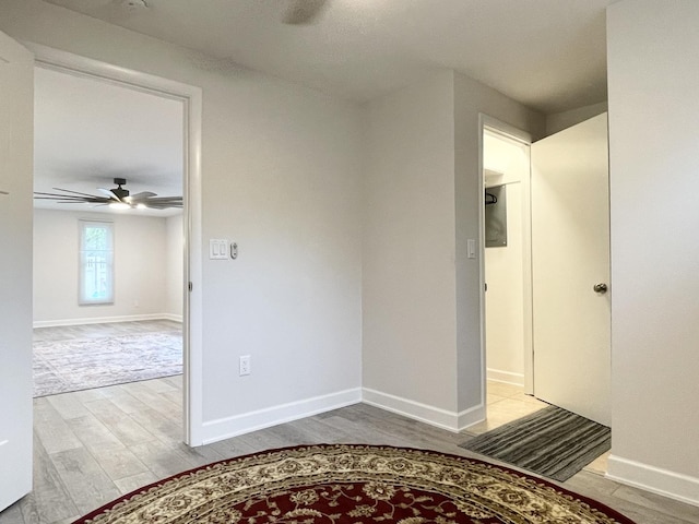 1299 Riverlane Dr, Bradley, IL 60915 - spare room featuring baseboards, wood finished floors, and ceiling fan