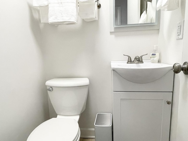 1299 Riverlane Dr, Bradley, IL 60915 - half bath with toilet, vanity, and baseboards