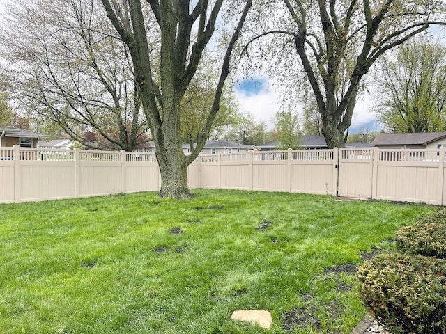 1299 Riverlane Dr, Bradley, IL 60915 - view of yard featuring a fenced backyard