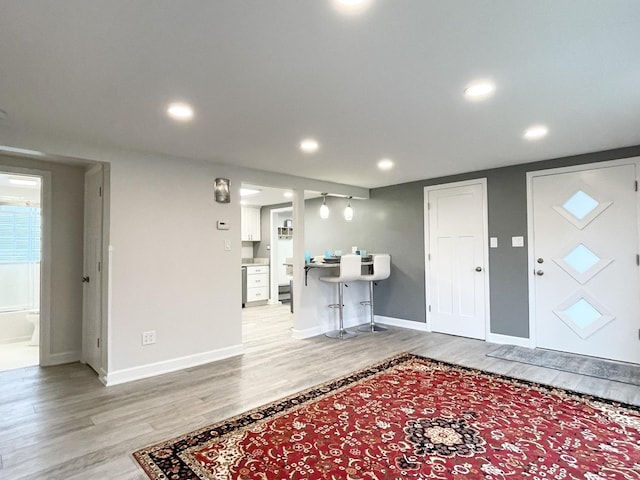 1299 Riverlane Dr, Bradley, IL 60915 - entrance foyer with baseboards, light wood finished floors, and recessed lighting