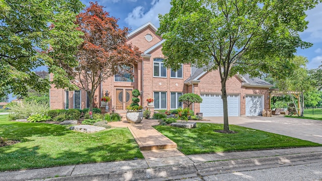 traditional-style home with a garage, brick siding, concrete driveway, and a front lawn