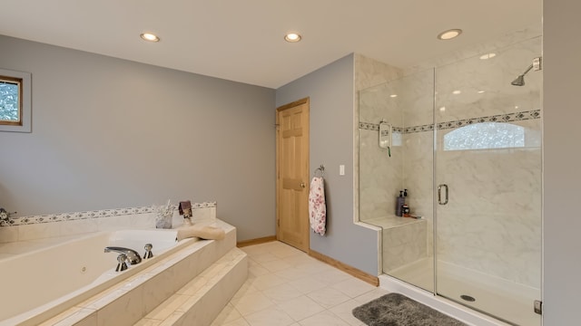 full bath with baseboards, recessed lighting, a shower stall, tile patterned floors, and a jetted tub