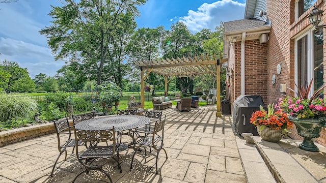 view of patio featuring area for grilling, outdoor dining space, a pergola, an outdoor living space, and fence