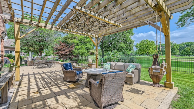 view of patio / terrace featuring outdoor lounge area, outdoor dining area, a fenced backyard, and a pergola