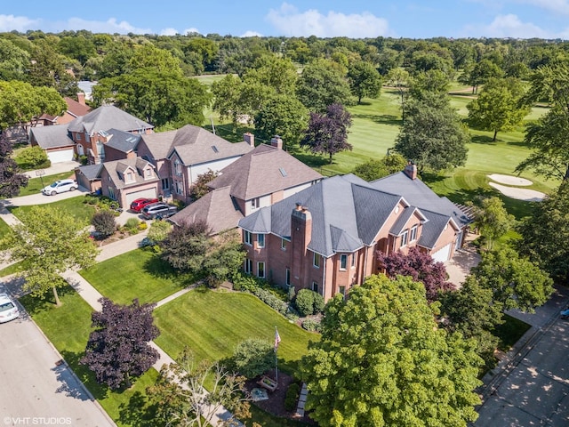 birds eye view of property with a residential view