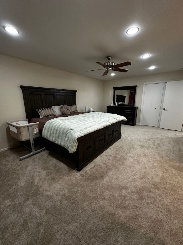 bedroom with recessed lighting, a ceiling fan, and light carpet