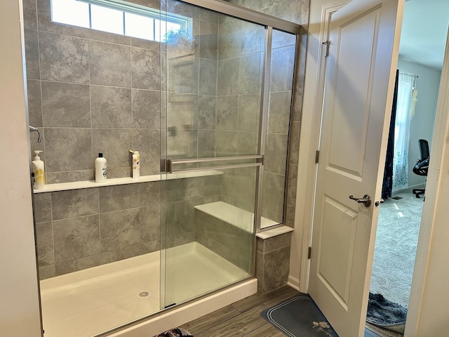 full bathroom featuring a shower stall