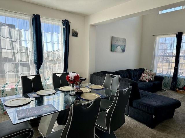 view of carpeted dining space