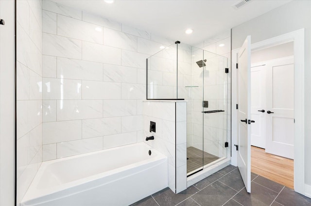 3502 S Union Ave, Chicago, IL 60609 - full bathroom featuring a shower stall, a tub, tile patterned floors, and recessed lighting