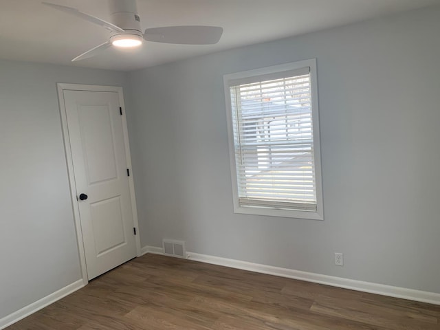 1613 Jones St, Joliet, IL 60435 - empty room featuring a ceiling fan and wood finished floors