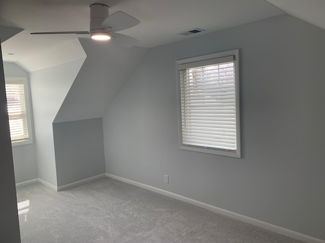 1613 Jones St, Joliet, IL 60435 - additional living space with ceiling fan, lofted ceiling, and carpet flooring