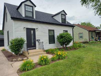 1613 Jones St, Joliet, IL 60435 - view of front of house with a front lawn