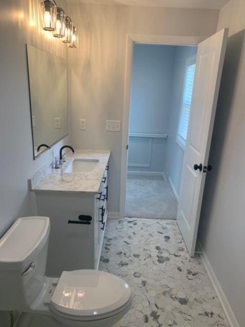 1613 Jones St, Joliet, IL 60435 - bathroom featuring vanity and toilet
