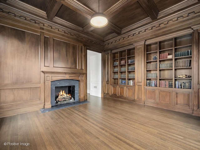 330 S County Line Rd, Hinsdale, IL 60521 - unfurnished living room with wooden ceiling, wood walls, built in shelves, coffered ceiling, and beam ceiling