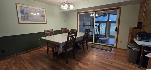 508 N Fayette, Carthage, IL 62321 - dining space with dark wood finished floors and a chandelier