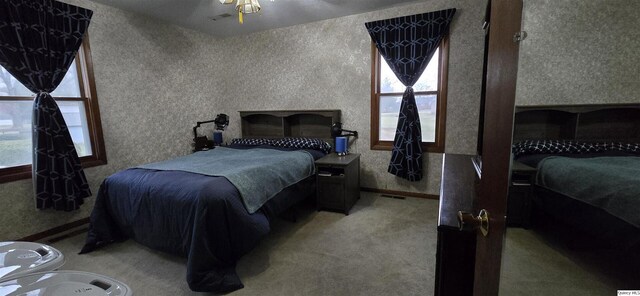 508 N Fayette, Carthage, IL 62321 - bedroom featuring light carpet, wallpapered walls, and baseboards