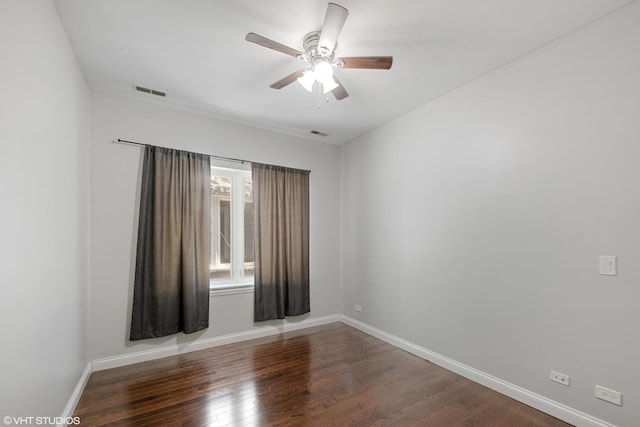 7170 W Grand Ave Unit 3E, Chicago, IL 60707 - empty room with visible vents, baseboards, wood finished floors, and ceiling fan