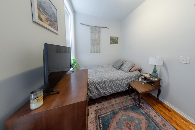 1304 N Campbell Ave, Chicago, IL 60622 - bedroom featuring baseboards and wood finished floors