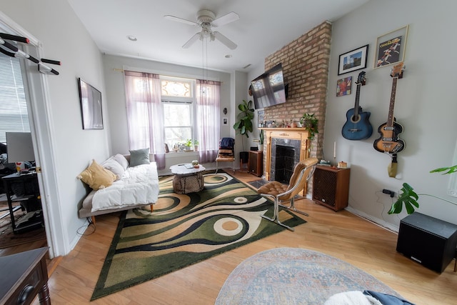1304 N Campbell Ave, Chicago, IL 60622 - living room with baseboards, a fireplace, a ceiling fan, and wood finished floors
