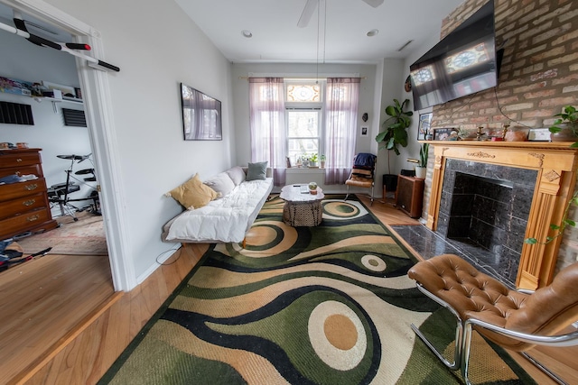 1304 N Campbell Ave, Chicago, IL 60622 - living room with baseboards, a fireplace, and wood finished floors