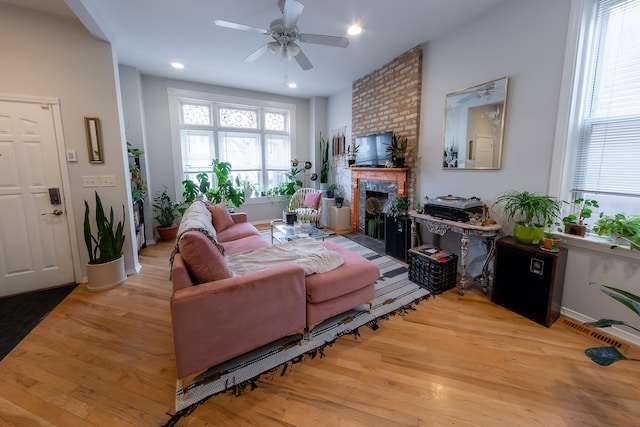 1304 N Campbell Ave, Chicago, IL 60622 - living room with recessed lighting, ceiling fan, a fireplace, and light wood finished floors