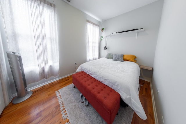 1304 N Campbell Ave, Chicago, IL 60622 - bedroom with baseboards and wood finished floors