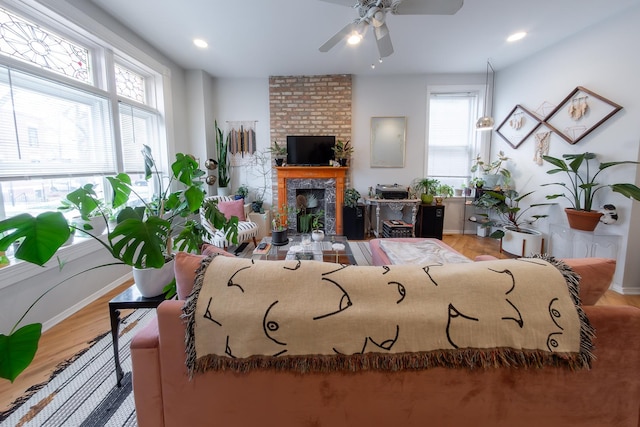 1304 N Campbell Ave, Chicago, IL 60622 - living room with baseboards, ceiling fan, a fireplace, and wood finished floors