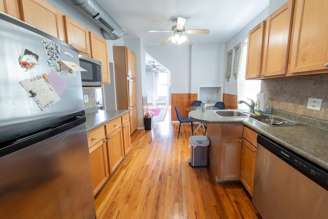1304 N Campbell Ave, Chicago, IL 60622 - kitchen featuring a healthy amount of sunlight, a ceiling fan, stainless steel appliances, and light wood-style flooring