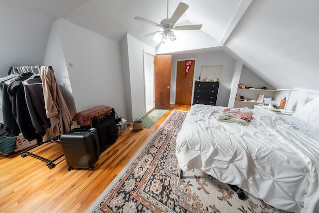 1304 N Campbell Ave, Chicago, IL 60622 - bedroom with a ceiling fan, vaulted ceiling, and wood finished floors