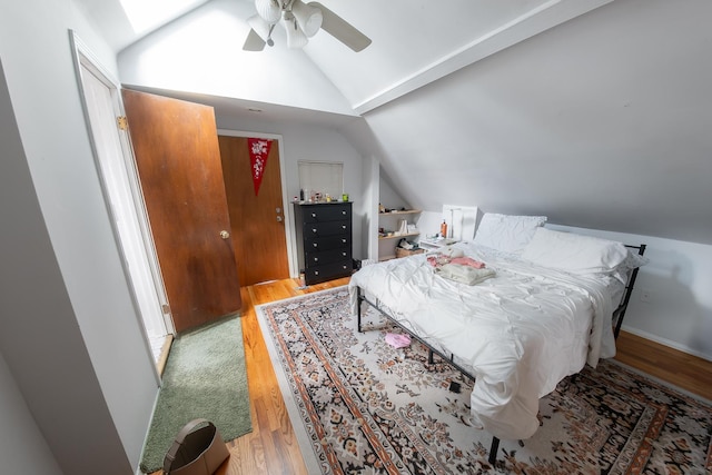 1304 N Campbell Ave, Chicago, IL 60622 - bedroom with light wood-type flooring, ceiling fan, and vaulted ceiling