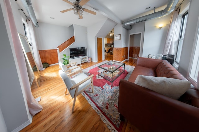 1304 N Campbell Ave, Chicago, IL 60622 - living area with a wainscoted wall, ceiling fan, light wood finished floors, and beam ceiling
