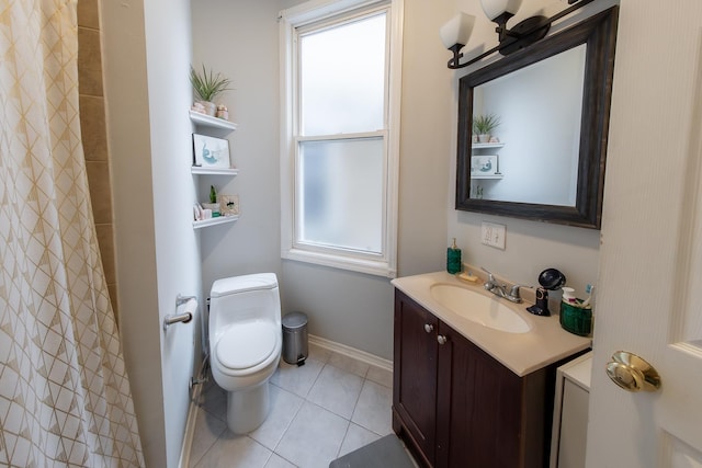 1304 N Campbell Ave, Chicago, IL 60622 - full bath with toilet, a wealth of natural light, tile patterned flooring, and vanity