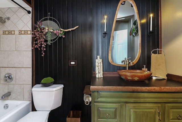 full bathroom featuring shower / bathing tub combination, vanity, and toilet