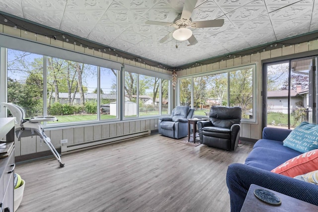23610 N Overhill Dr, Lake Zurich, IL 60047 - sunroom featuring baseboard heating, a ceiling fan, and outdoor lounge area