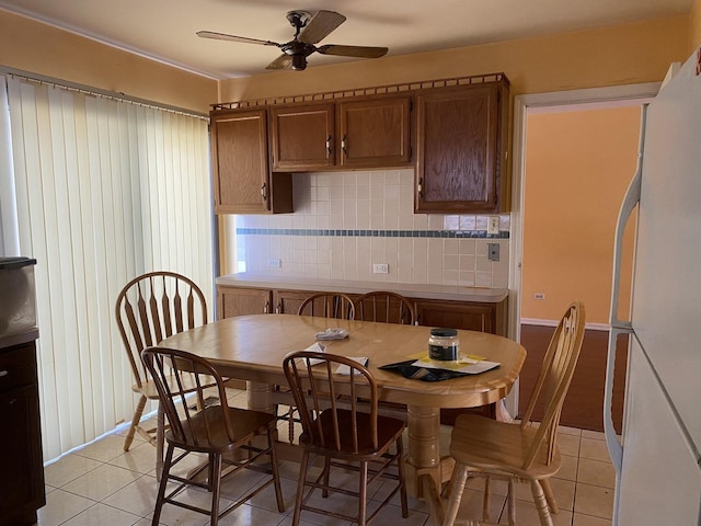 1938 Wildwood Cir, Glendale Heights, IL 60139 - dining space with light tile patterned floors and ceiling fan