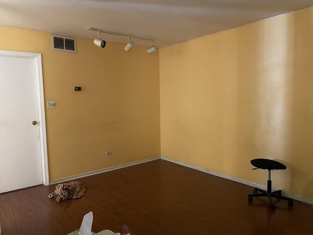 1938 Wildwood Cir, Glendale Heights, IL 60139 - unfurnished room with visible vents, baseboards, and dark wood-type flooring