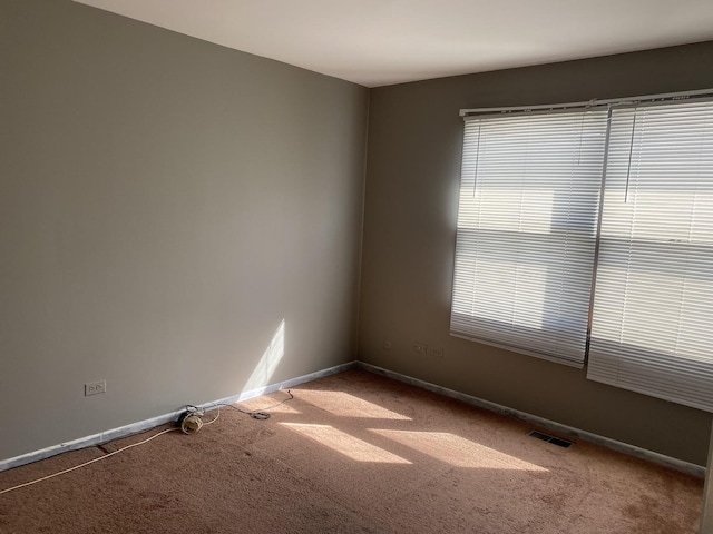 1938 Wildwood Cir, Glendale Heights, IL 60139 - carpeted empty room with visible vents and baseboards