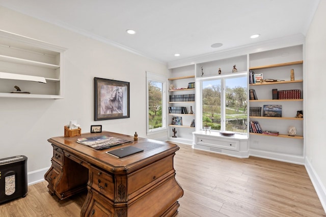 office with light wood-style floors, baseboards, ornamental molding, and recessed lighting