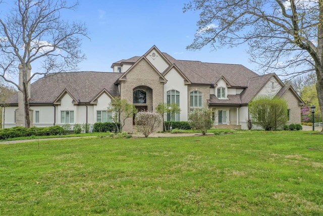 10 Old Hart Rd, Barrington Hills, IL 60010 - french provincial home featuring a front lawn and stucco siding