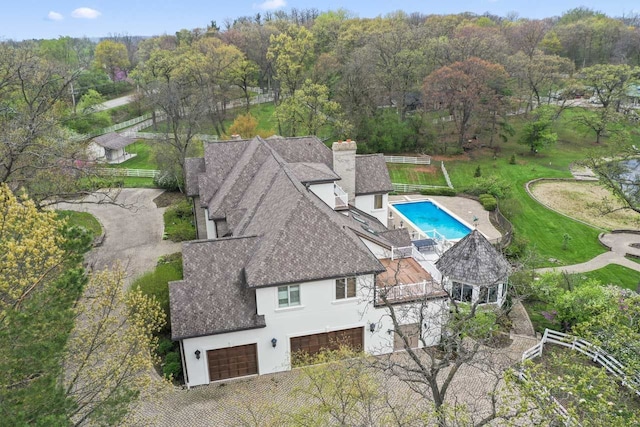 bird's eye view with a forest view