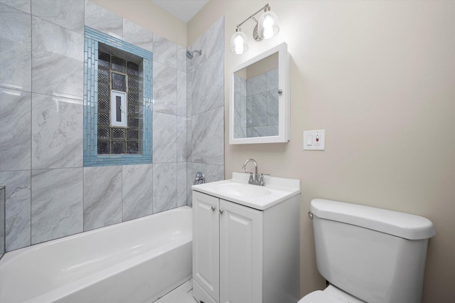 bathroom featuring vanity, bathing tub / shower combination, and toilet