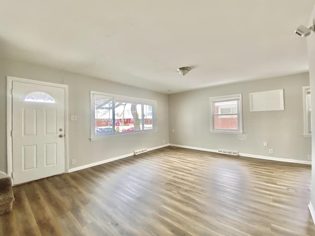 351 Clyde Ave, Calumet City, IL 60409 - entryway with visible vents, wood finished floors, and baseboards