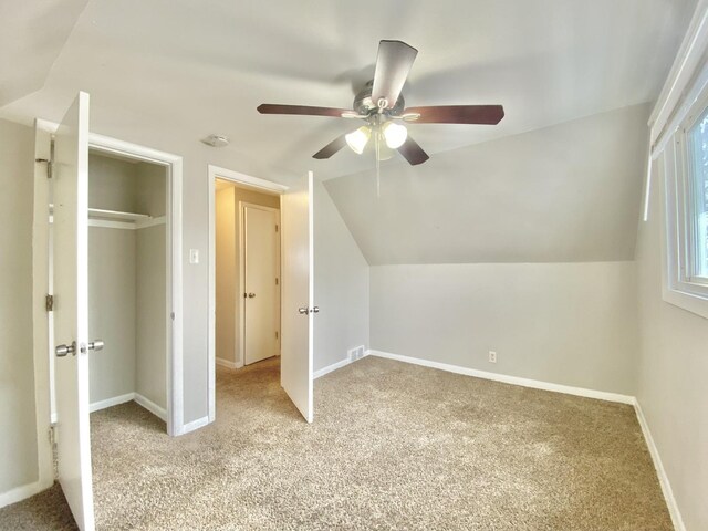 351 Clyde Ave, Calumet City, IL 60409 - additional living space with carpet floors, baseboards, visible vents, a ceiling fan, and lofted ceiling