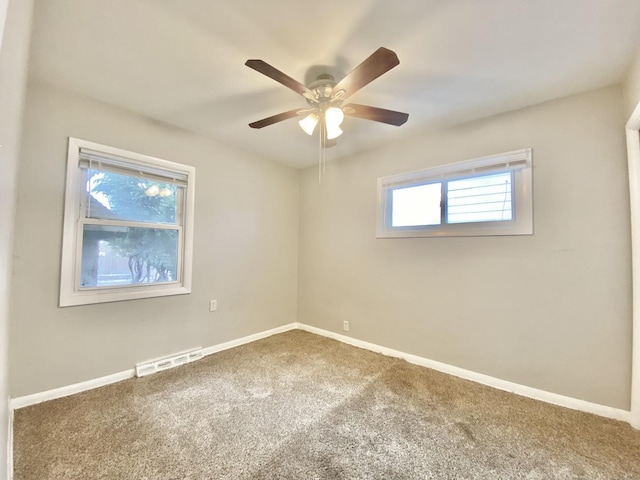 351 Clyde Ave, Calumet City, IL 60409 - unfurnished room featuring baseboards, carpet flooring, ceiling fan, and visible vents